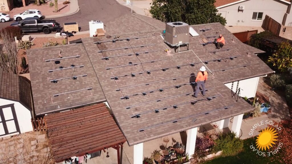 Workers working on solar panels