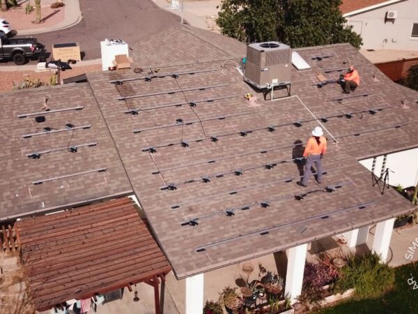Workers working on solar panels